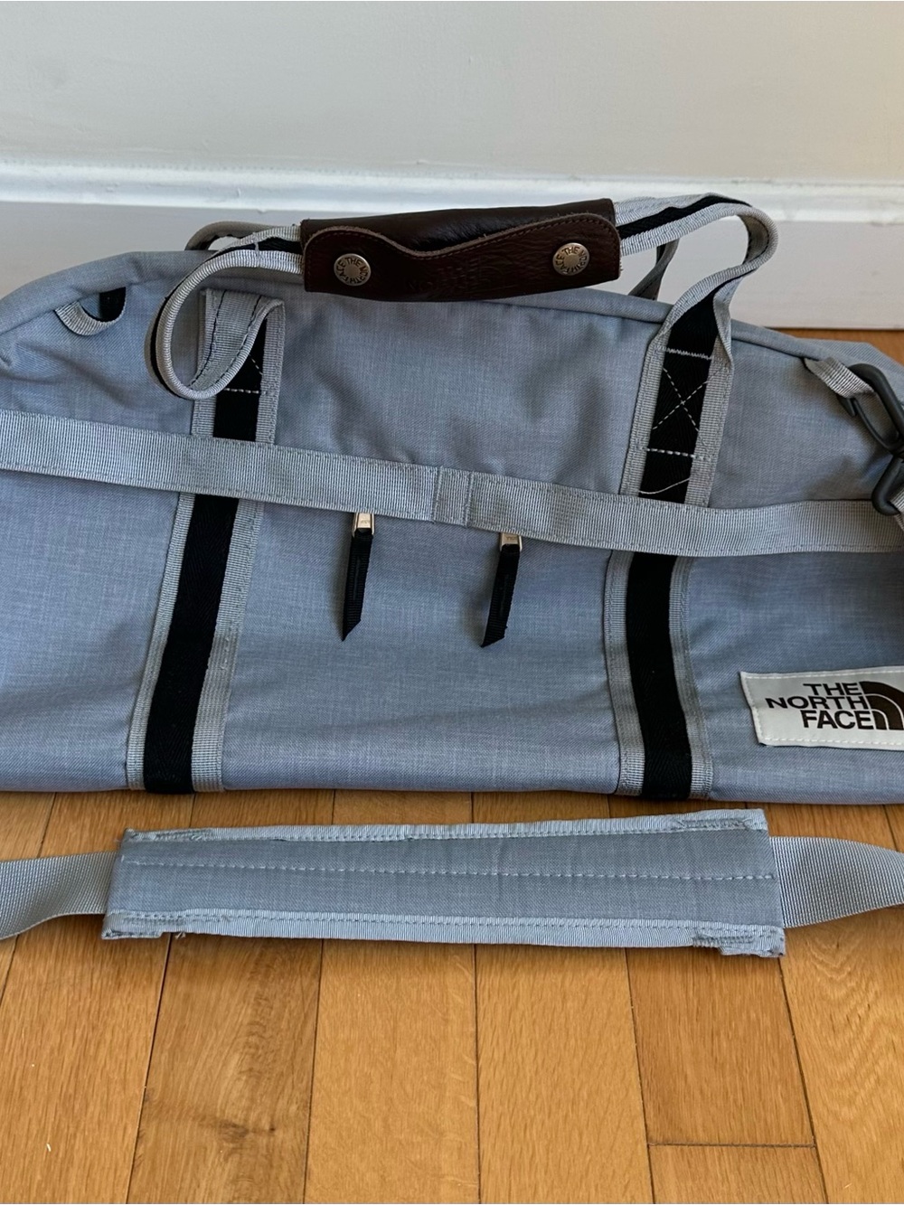 The North Face Light Gray Duffel with Black Trim